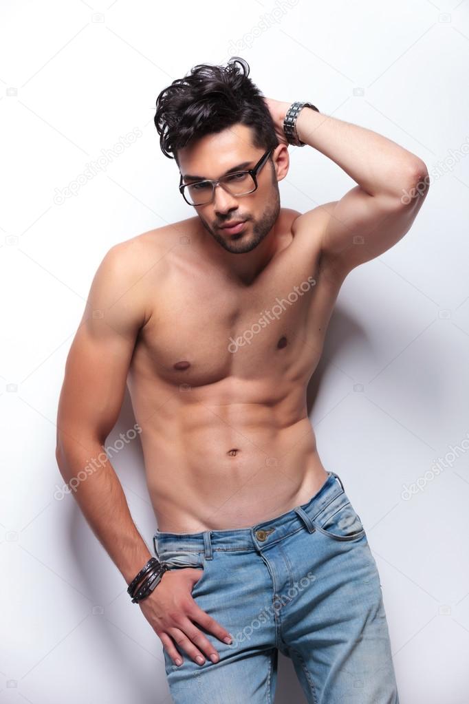 Pose of a casual young man stock photo. Image of smiling - 37224148