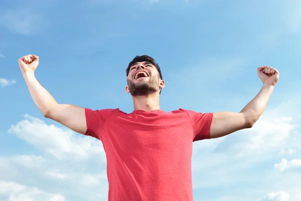 Casual man shouting victorious — Stock Photo, Image