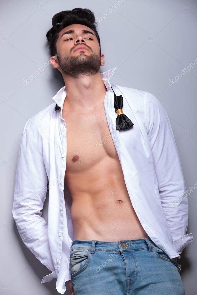 attractive young man leaning back