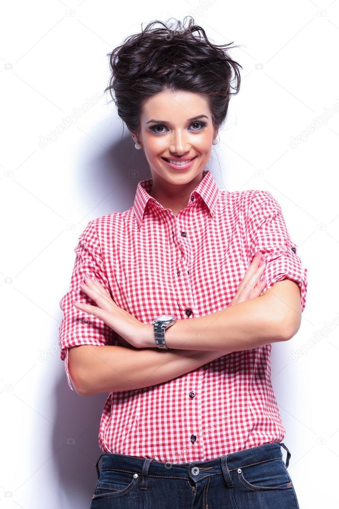 casual woman smiling with hands crossed