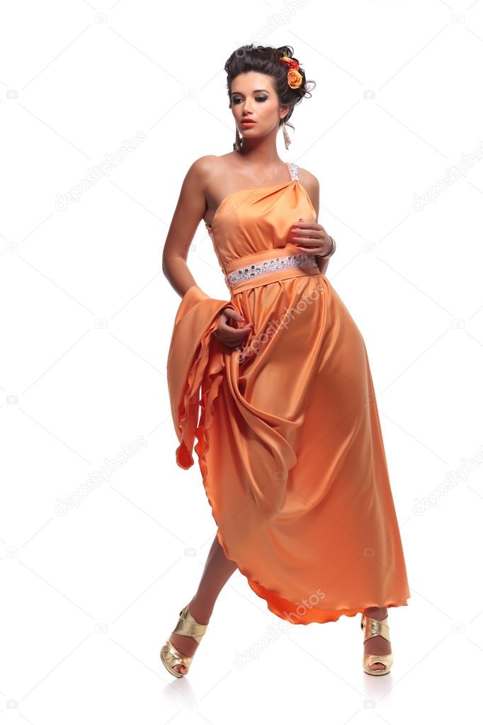 young woman in a beautiful elegant dress
