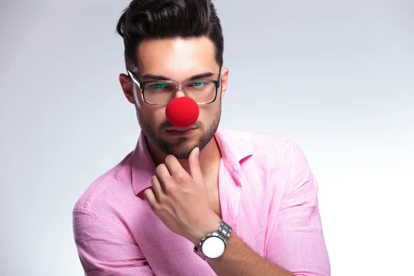 Pensive fashion young man with red nose — Stock Photo, Image