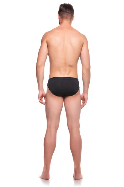 Vista posterior de un hombre en su ropa interior — Foto de Stock