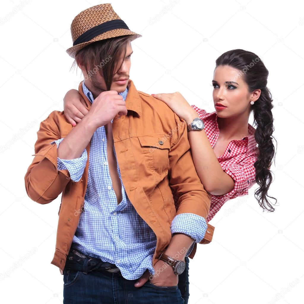 casual couple with woman looking at man