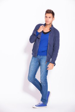 young casual man looking away