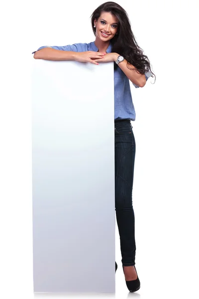 Casual woman with a blank board — Stock Photo, Image