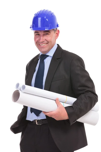 Senior engineer holding some papers — Stock Photo, Image