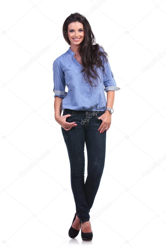 casual woman with both thumbs in pockets