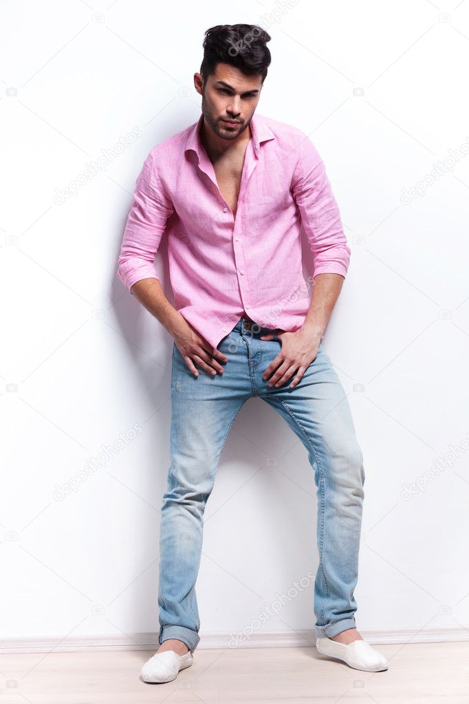 young fashion man with hands at crotch