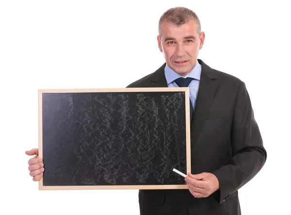 Blackboard tebeşir ile iş adamı Puan — Stok fotoğraf