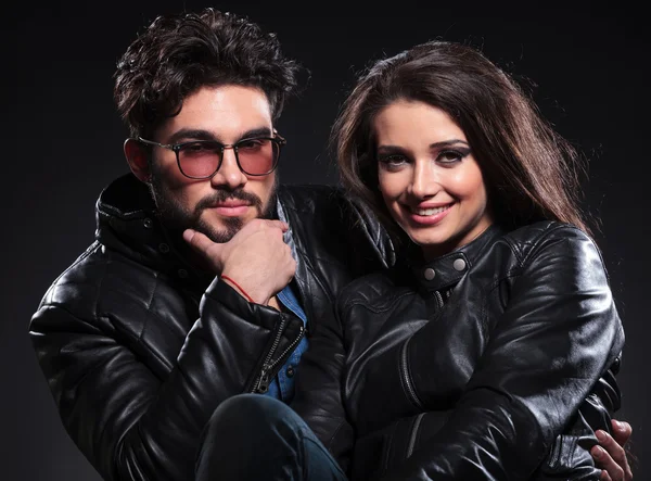 Young couple in leather jackets, pensive man — Stock Photo, Image