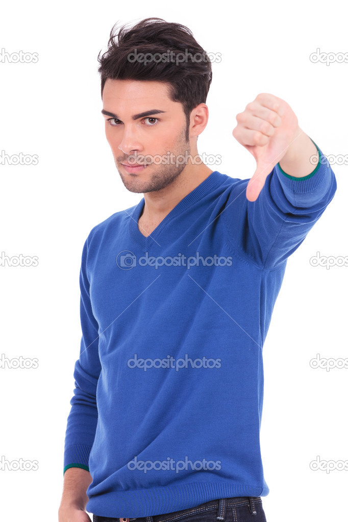 man making the thumbs down negative hand sign