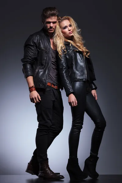 Full body picture of a man and woman in leather clothes — Stock Photo, Image