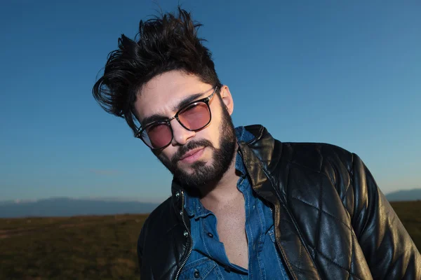 Young man with long beard and glasses — Stock Photo, Image