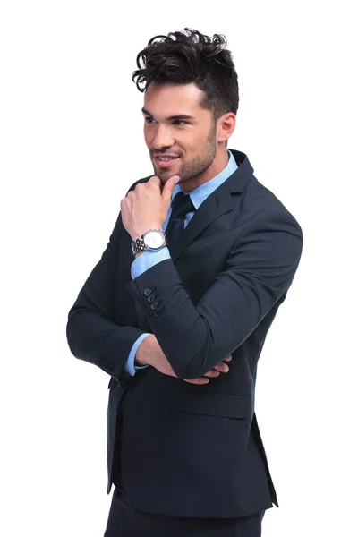 Side view of a young pensive business man — Stock Photo, Image