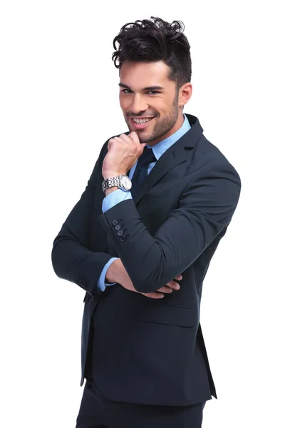 Portret van een glimlachende en nadenkend zakenman — Stockfoto