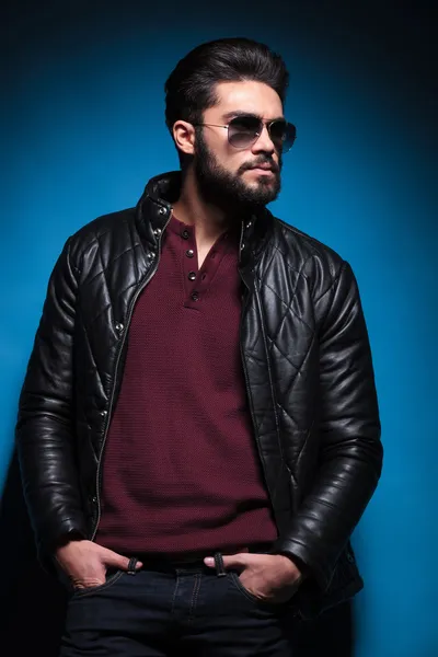 Side view profile of a young bearded fashion man in leather jack — Stock Photo, Image