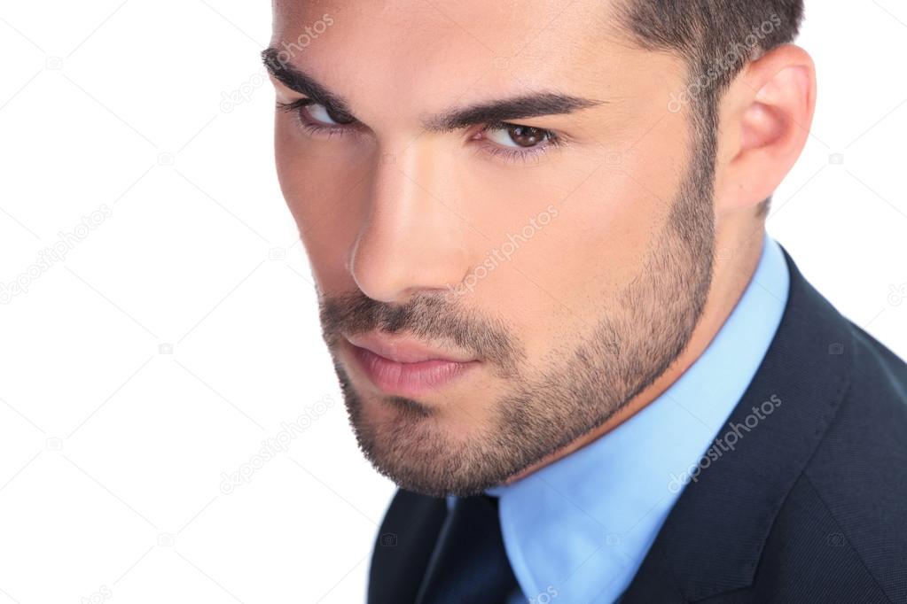 closeup picture of a serious young business man