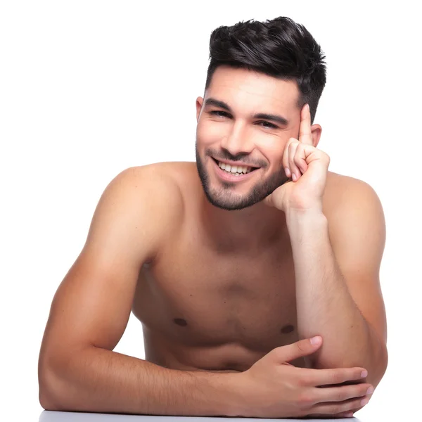 Pensive beauty naked man is laughing — Stock Photo, Image
