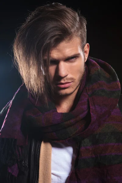 Young man in leather jacket and a big scarf — Stock Photo, Image