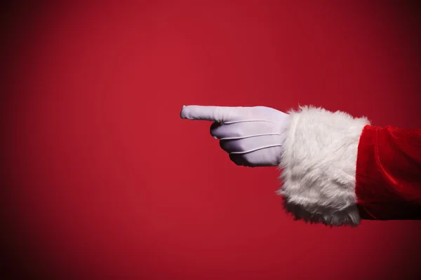산타 클로스 장갑 낀된 손으로 가리키는 손가락 — 스톡 사진