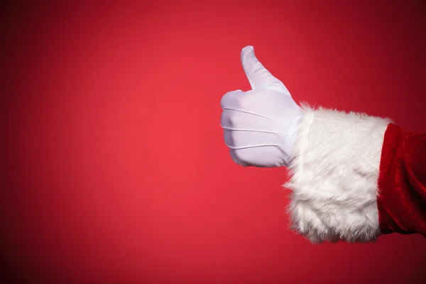 Santa Claus hand showing thumbs up ok sign — Stock Photo, Image