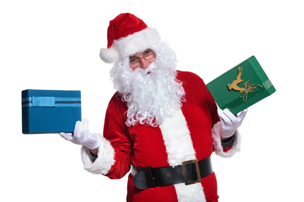Père Noël claus tenant deux boîtes-cadeaux — Photo