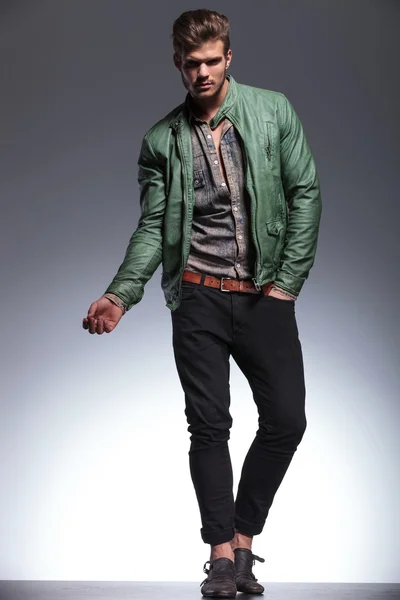 Young casual man in leather jacket posing — Stock Photo, Image