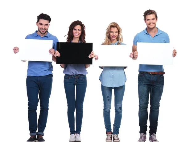 Group of casual people presenting blank cards — Stock Photo, Image