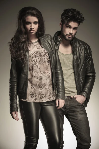 Fashion man and woman in leather clothes — Stock Photo, Image