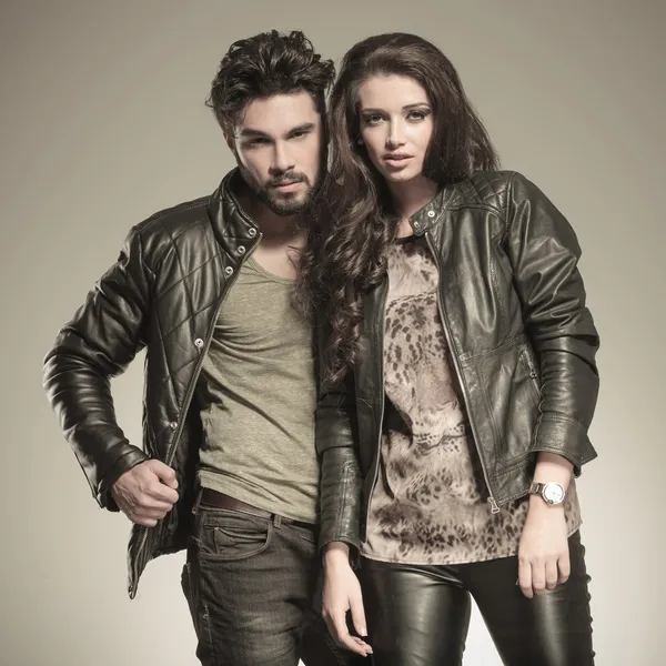 Young couple posing in studio — Stock Photo, Image