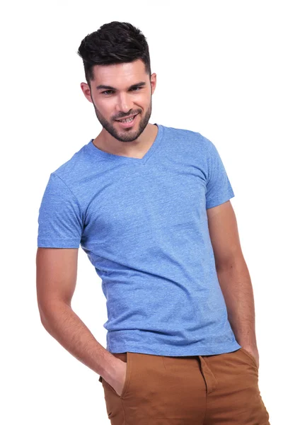 Young casual man with hands in his pockets — Stock Photo, Image