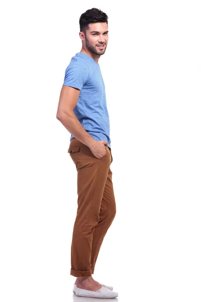 Young casual man with hands in his pockets — Stock Photo, Image