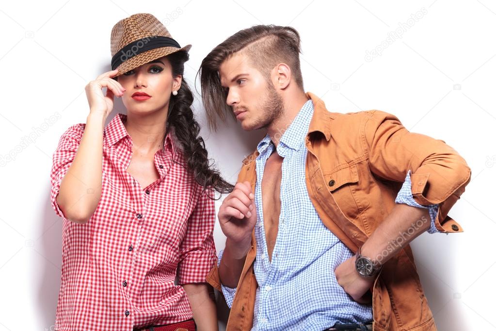 relaxed man playing with girlfriend's hair