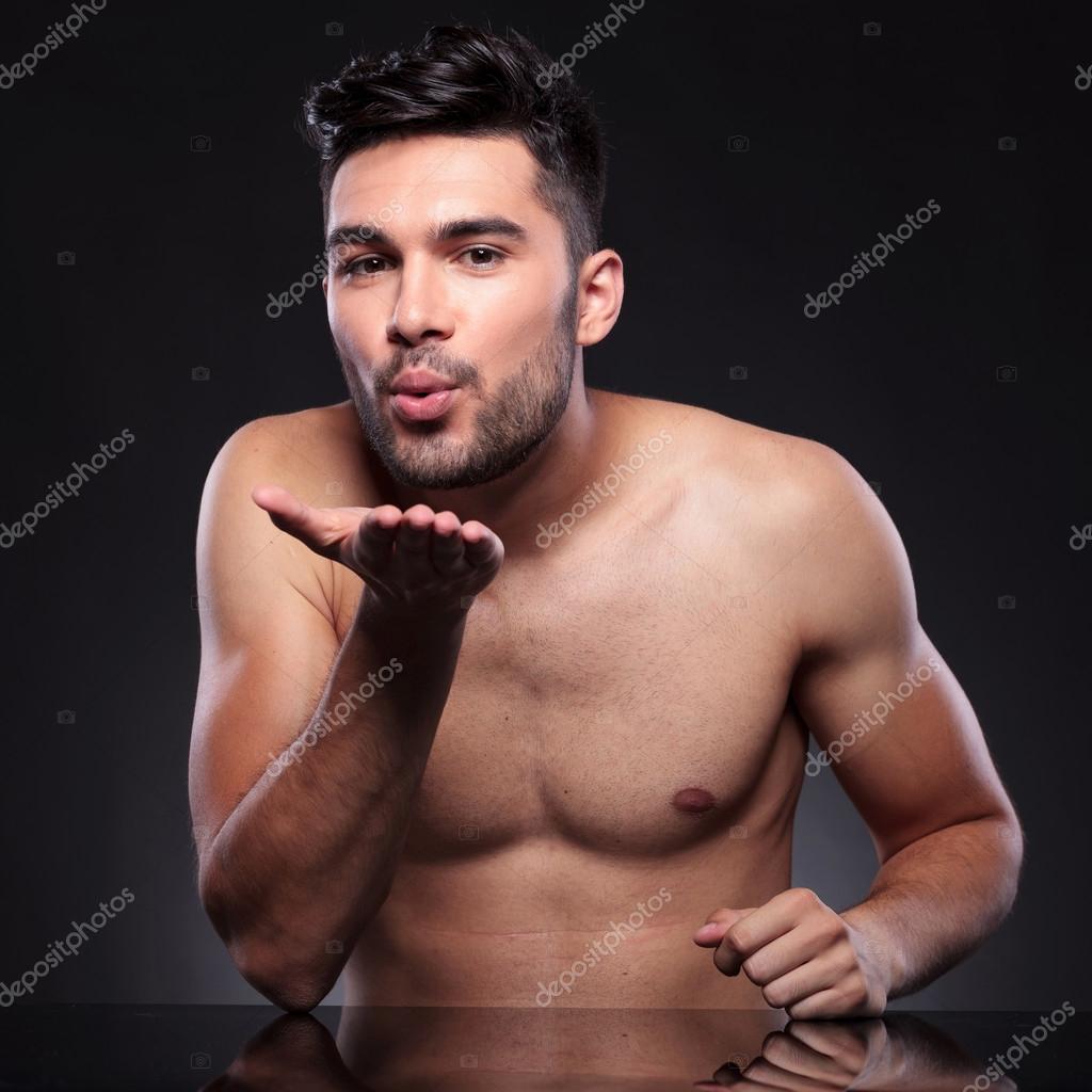 Naked young man sends you a kiss — Stock Photo © feedough #42447635