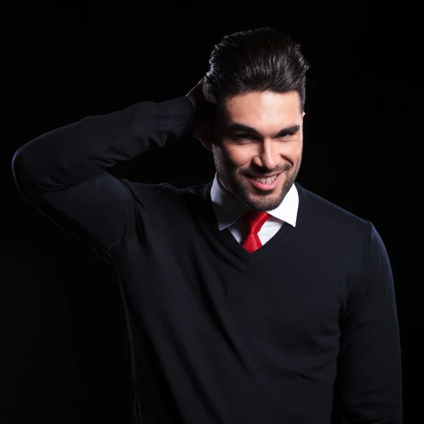 Business man fixes his hair — Stock Photo, Image