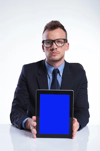 Business man holds his tablet — Stock Photo, Image