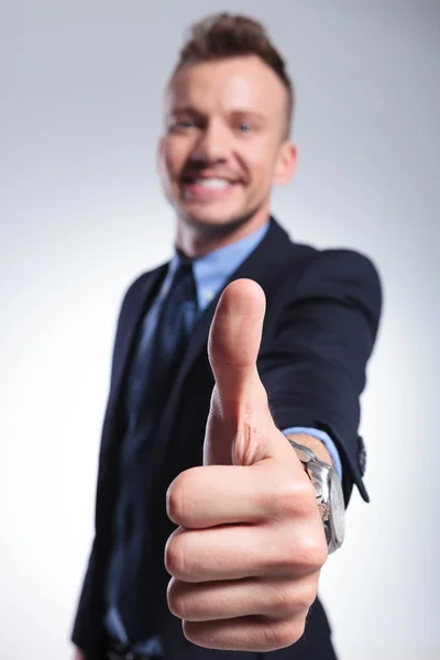 Thumb up from a business man Royalty Free Stock Photos