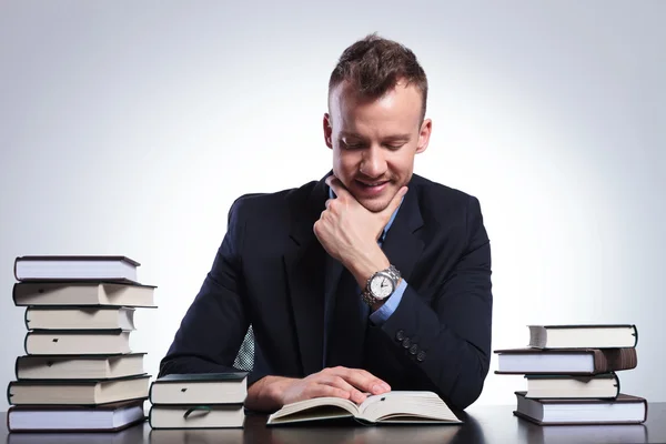 Business man reads interesting book — Stock Photo, Image