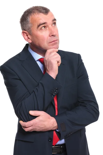 Pensive business man looks away — Stock Photo, Image