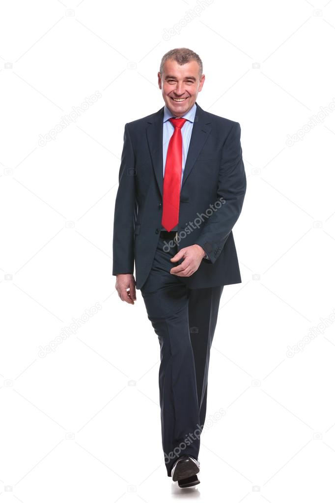 business man walks to you