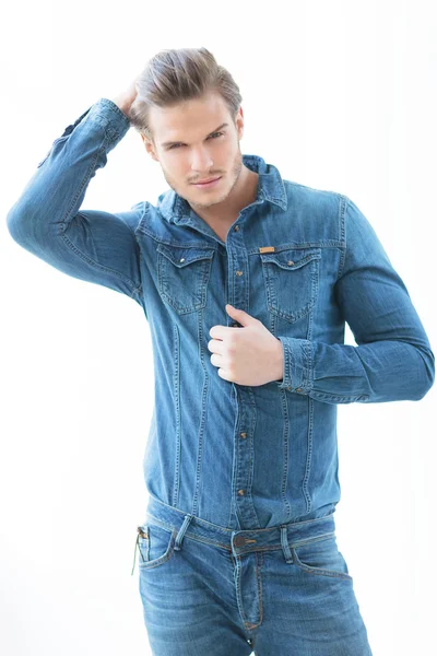 Smiling man  fixing his hair — Stock Photo, Image