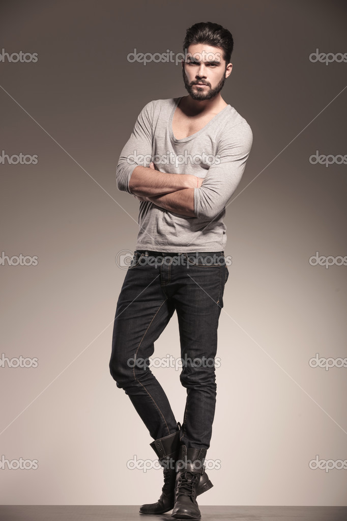 Serious young man with hands crossed — Stock Photo © feedough #46575473