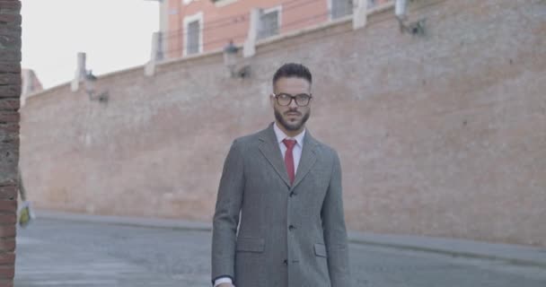 Unshaved Attractive Guy Wearing Suit Long Coat Holding Suitcase Looking — Stock Video