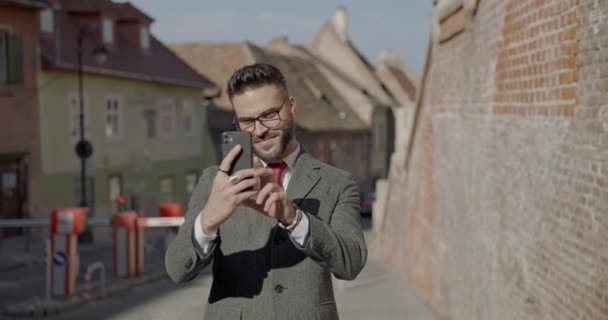 Handsome Young Businessman Elegant Suit Holding Phone Taking Selfies Smiling — Stock Video