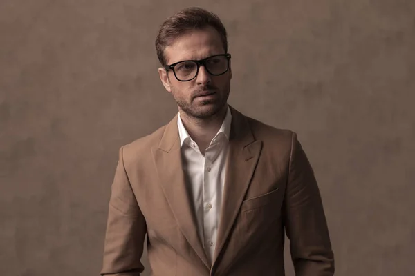 Young Sexy Businessman Wearing Eyeglasses Nice Suit Looking Away Brown — Zdjęcie stockowe