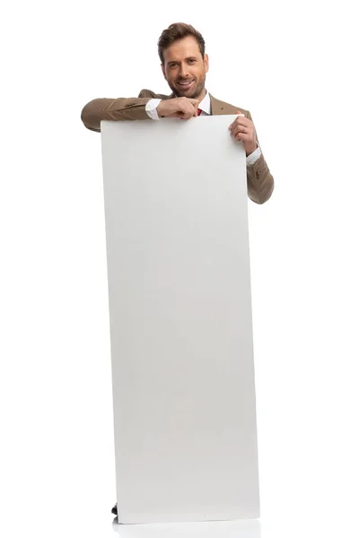 Handsome Businessman Showing His White Board Camera Smiling White Background — Stock Photo, Image