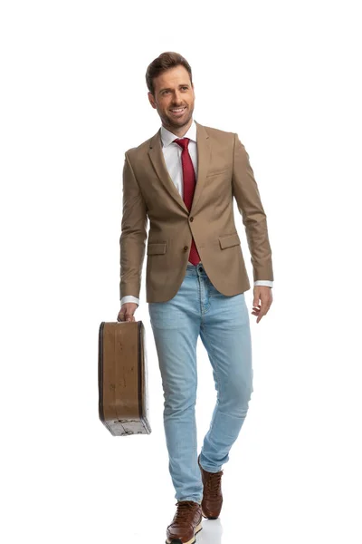 Handsome Businessman Walking His Briefcase Looking Away Smiling Camera — Foto Stock