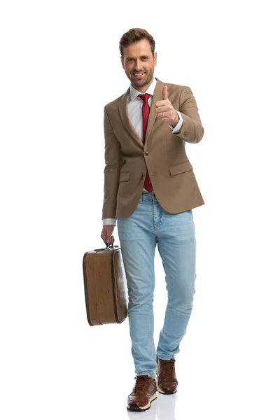 Sexy Businessman Giving Thumbs While Walking Holding Briefcase White Background — Stock Photo, Image