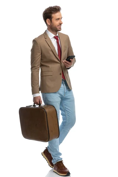 Sexy Businessman Looking Away Texting His Phone Holding Briefcase White — Foto de Stock